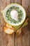 ChanguaÂ is a Colombian breakfast soup that is both delicious and comforting closeup in the plate. Vertical top view